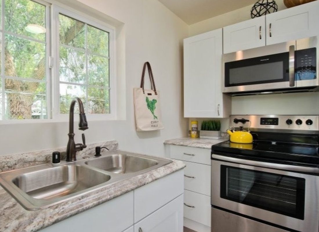 Open concept kitchen design by SD Build Co